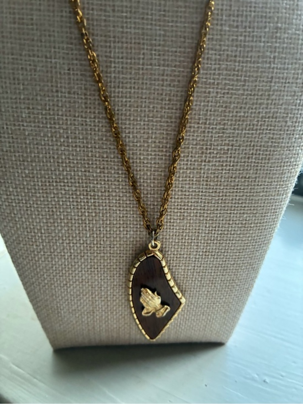 Gold-Tone Brown Wood Pendant Necklace with Prayer Hands